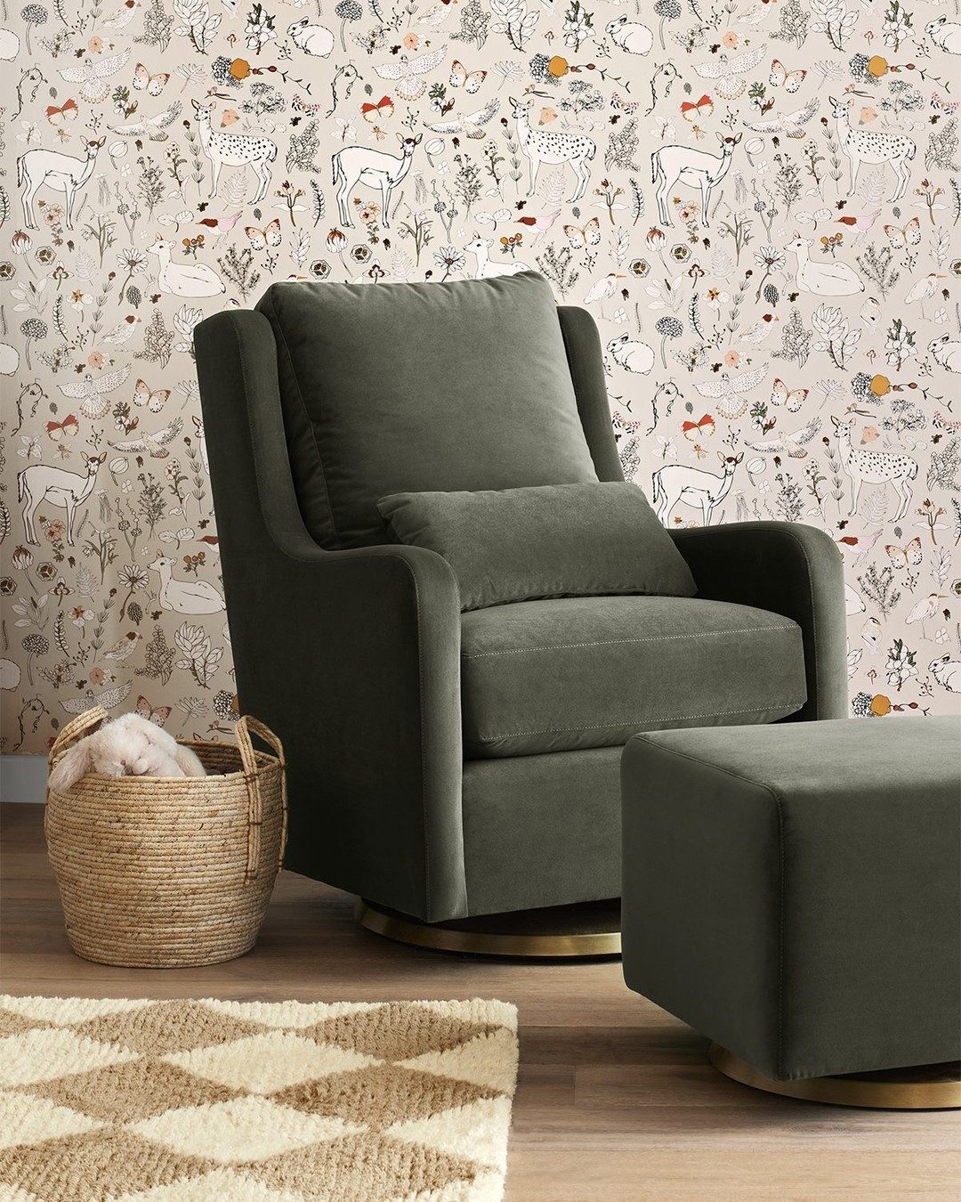 Olive-green swivel glider with matching ottoman in a cozy nursery corner
